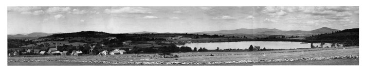 A black and white panoramic photo of Mechanicsville (now Belmont) and Jackson's Pond (now Star Lake).